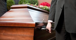 pallbearer holding casket